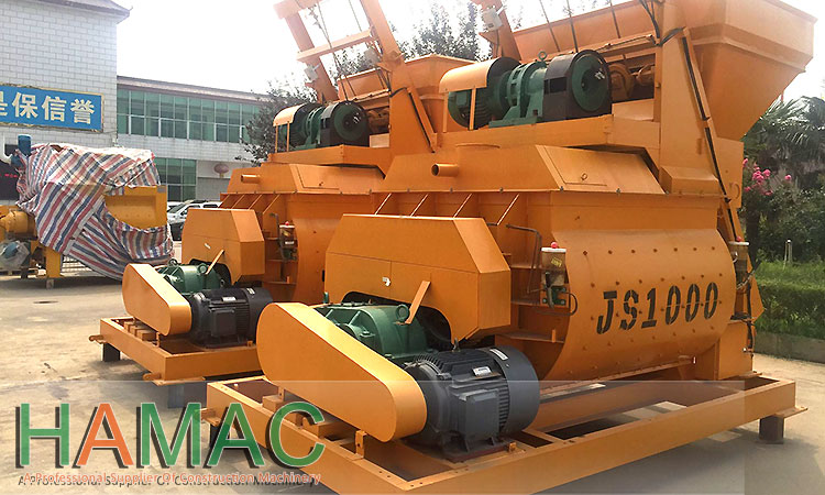 Concrete mixer and screw conveyor